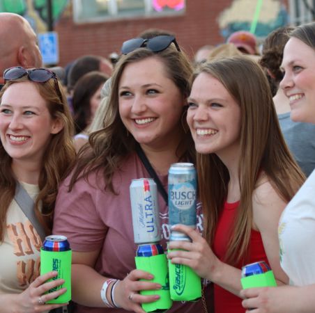Group of girls at Pizza Pie Looza concert in 2022